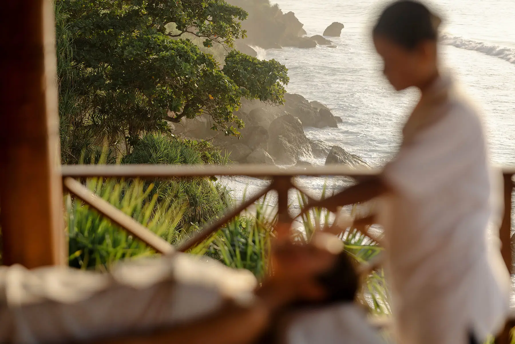 A quiet open-air wellness treatment overlooking the Sumba coast